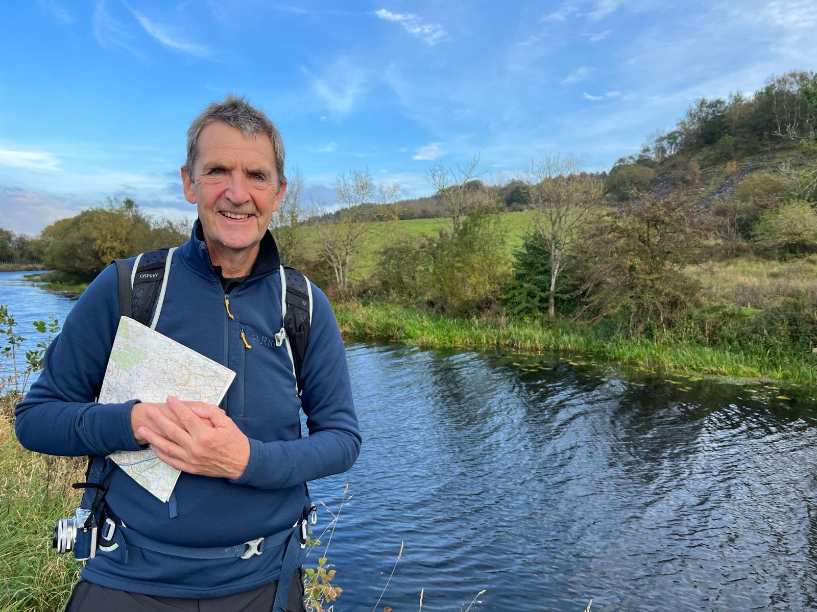 Ken Heptonstall Stoood in front of a river